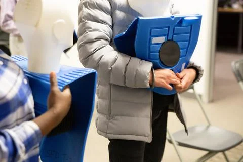 CPR training class by security guard in office Stock Photos
