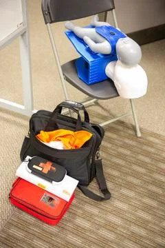 CPR training class by security guard in office Stock Photos