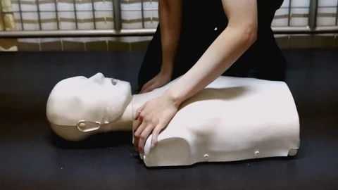 CPR training demonstrating Stock Footage 72588558