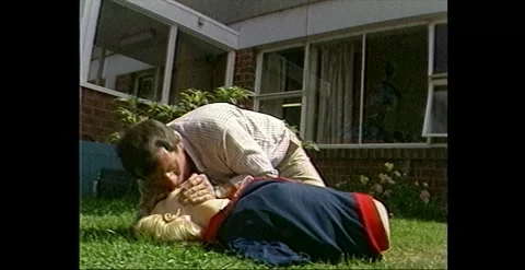 CPR Training Demonstration, Australia (1990s) Video stock 317736354