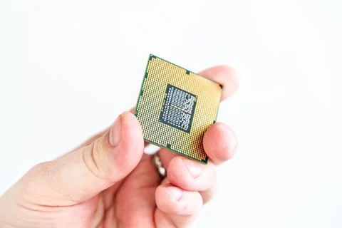 Cpu (Central Processing Unit) or Microchip Computer in the hands of a master Stock Photos
