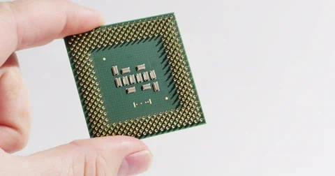 CPU for Computer Being Held Isolated on White, 4K Stock Footage 62770419