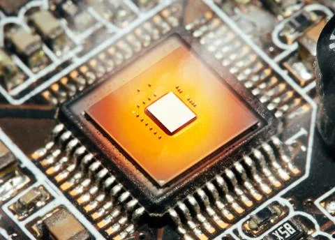 The CPU computer processor unit chipset overheats and burns in the socket Stock Photos
