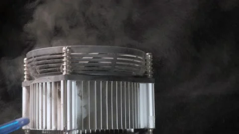 CPU cooler on a black background, blown from the dust by a pear Stock Footage 131094851