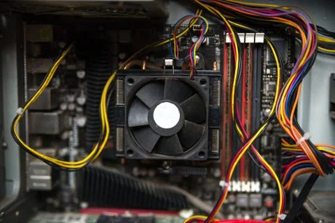 CPU cooler on the computer's motherboard. Close up view. Stock Photos