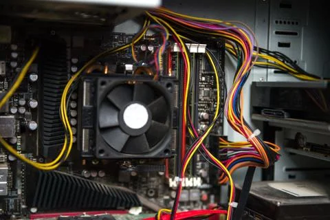 CPU cooler on the computer's motherboard. Close up view. Stock Photos