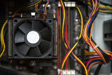 CPU cooler on the computer's motherboard. Close up view. Stock Photos