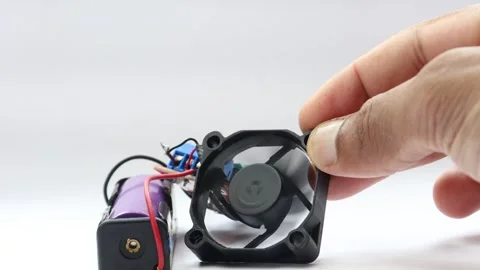 CPU cooler fan connected to battery and pwm speed controller board Vídeo Stock 341538885