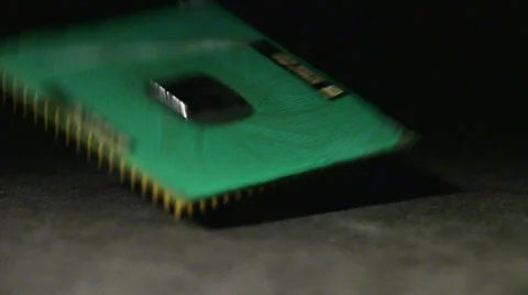 CPU Falling Pin Side Down in Slow Motion Isolated on Black Stock Footage 62771094