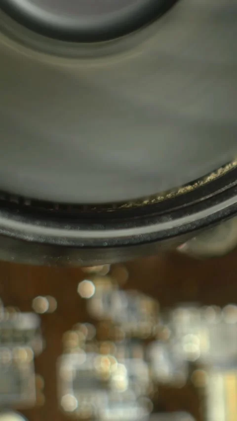 CPU fan close up. A very dirty CPU cooler starts spinning and then stops. Stock Footage 294985187