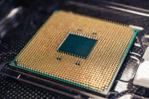 CPU golden pins contacts, processor unit close-up 写真素材