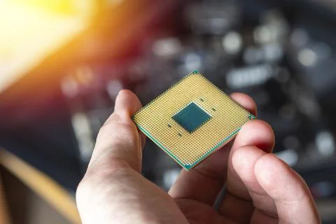 CPU in hand Stock Photos