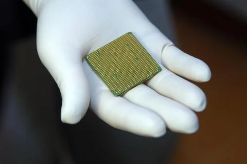 CPU in hand Stock Photos