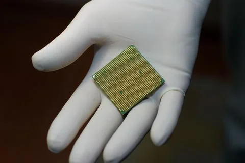 CPU in hand Stock Photos