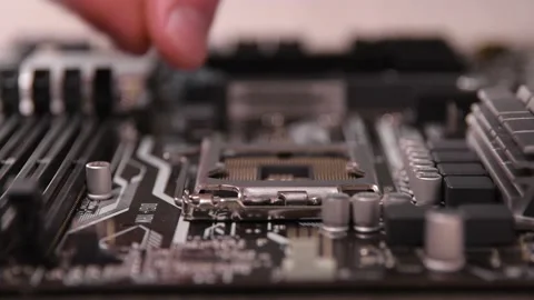 CPU installation in the motherboard.Installing computer processor. Stock Footage 135409166