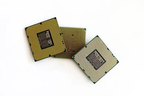 Cpu microchip computer gold side on white isolated background Stock Photos