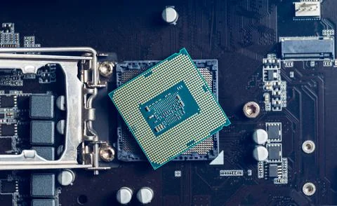 CPU microprocessor on socket of the motherboard. Concept of Computer. Stock Photos