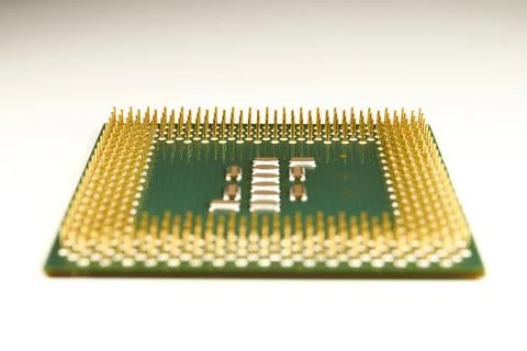 CPU. An old processor of 2001 release P III-800 on a white background. Stock Photos