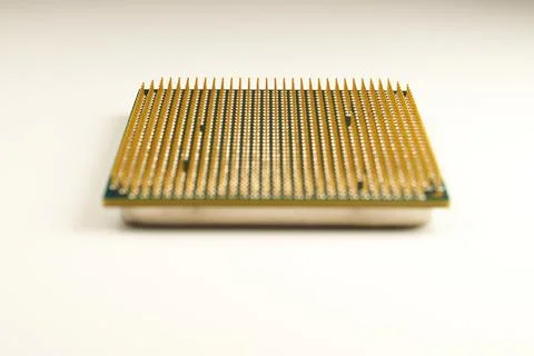 CPU. An old processor of 2009 release Athlon II X2 240 on a white background. Stock Photos