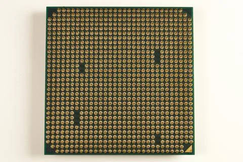 CPU. An old processor of 2009 release Athlon II X2 240 on a white background. Stock Photos