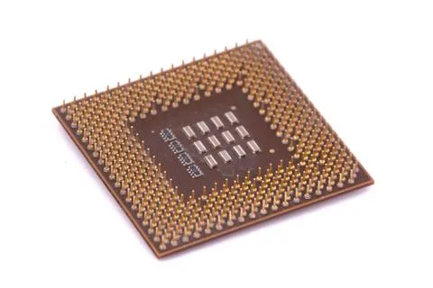 Cpu pins up the back glisten on a white background . isolated Stock Photos