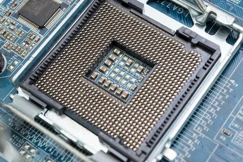 CPU placed on the socket of the motherboard. Place for the processor. Stock Photos