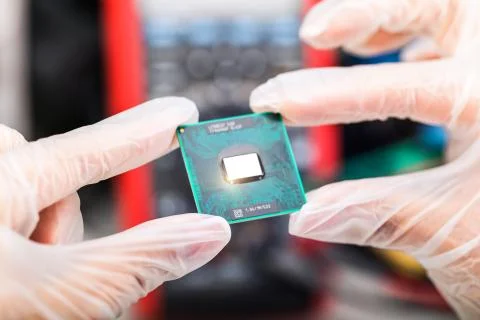 CPU processor in hands Stock Photos