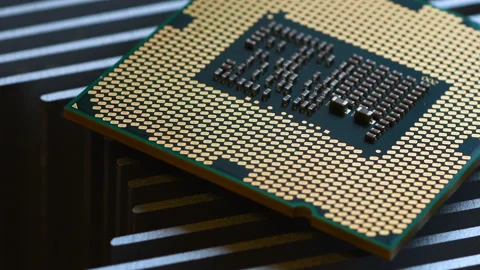 CPU processor spins over a aluminum heatsink. Stock Footage 160325418