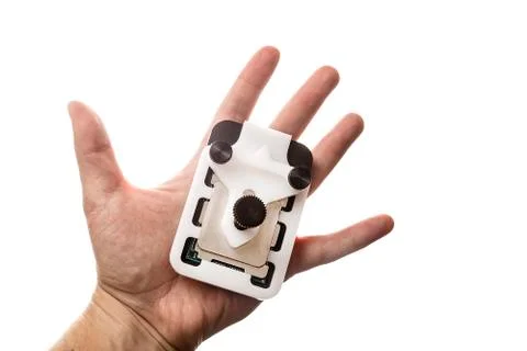 CPU in relid device in man's hand isolated on white background. Stock-Fotos