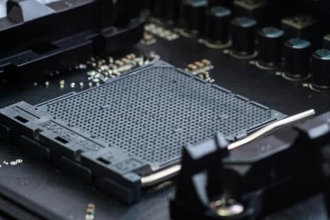 CPU socket and processor on the motherboard. Focus on the motherboard. 스톡 사진