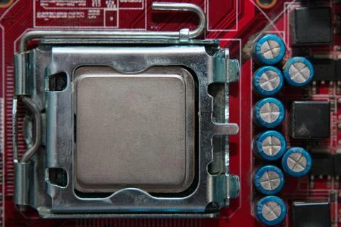 CPU socket on motherboard with installed a processor Stock Photos