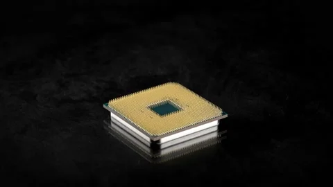 CPU. Studio macro photography of a computer processor. Gold plated contacts are Stock Footage 145371241