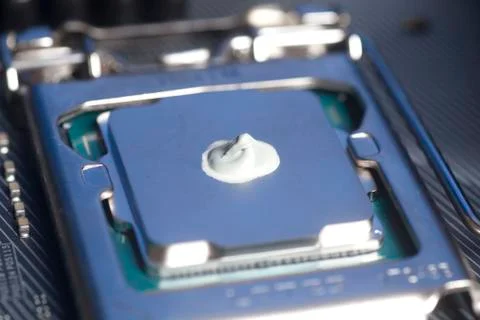 CPU with thermal paste applied. Stock Photos
