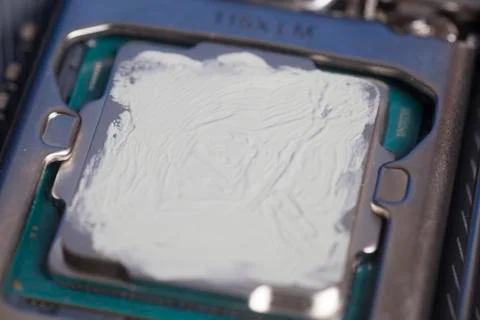 CPU with thermal paste applied. Stock Photos
