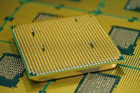 CPU unit close up revealing metallic pins essential for electrical signals Stock Photos