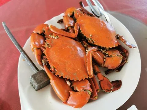 Crab Dish with Utensils Stock Photos