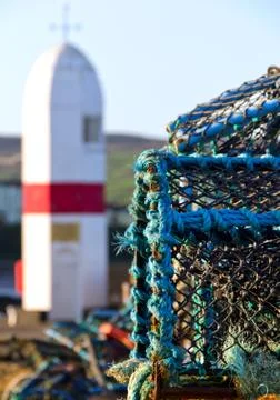 Crab nets closeup with Lighthouse in background Stock-Fotos