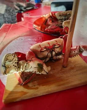 Crab posing on the meat board Stock Photos