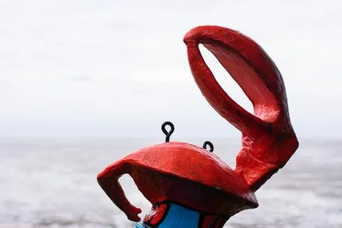 Crab statue on beach Stock Photos