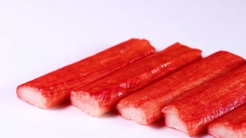 Crab sticks on white background, rotating Stock Footage 302038706