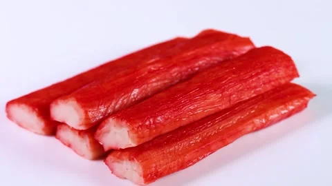 Crab sticks on white background, rotating Stock Footage 303735271