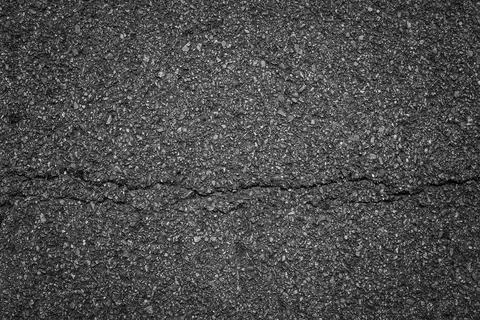 Crack asphalt background Stock Photos
