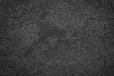Crack background texture of rough asphalt top view Stock Photos