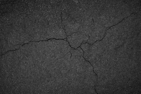 Crack background texture of rough asphalt top view Stock Photos
