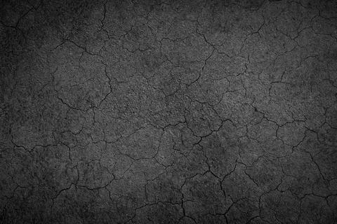 Crack background texture of rough asphalt Stock Photos