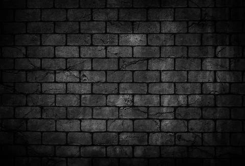 Crack brick wall black background Stock Photos