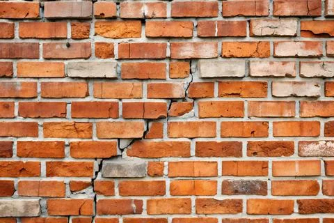 A crack in a brick wall. Stock-Fotos