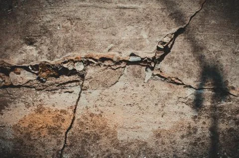 The crack in the concrete wall, background. Stock Photos