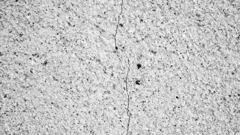 Crack in a concrete wall. Damage to a wall, foundation surface, animation. Stock Footage 316530517