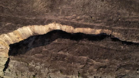 Crack in dry ground. Dry lake in process of drought and lack of rain Видео 186519862